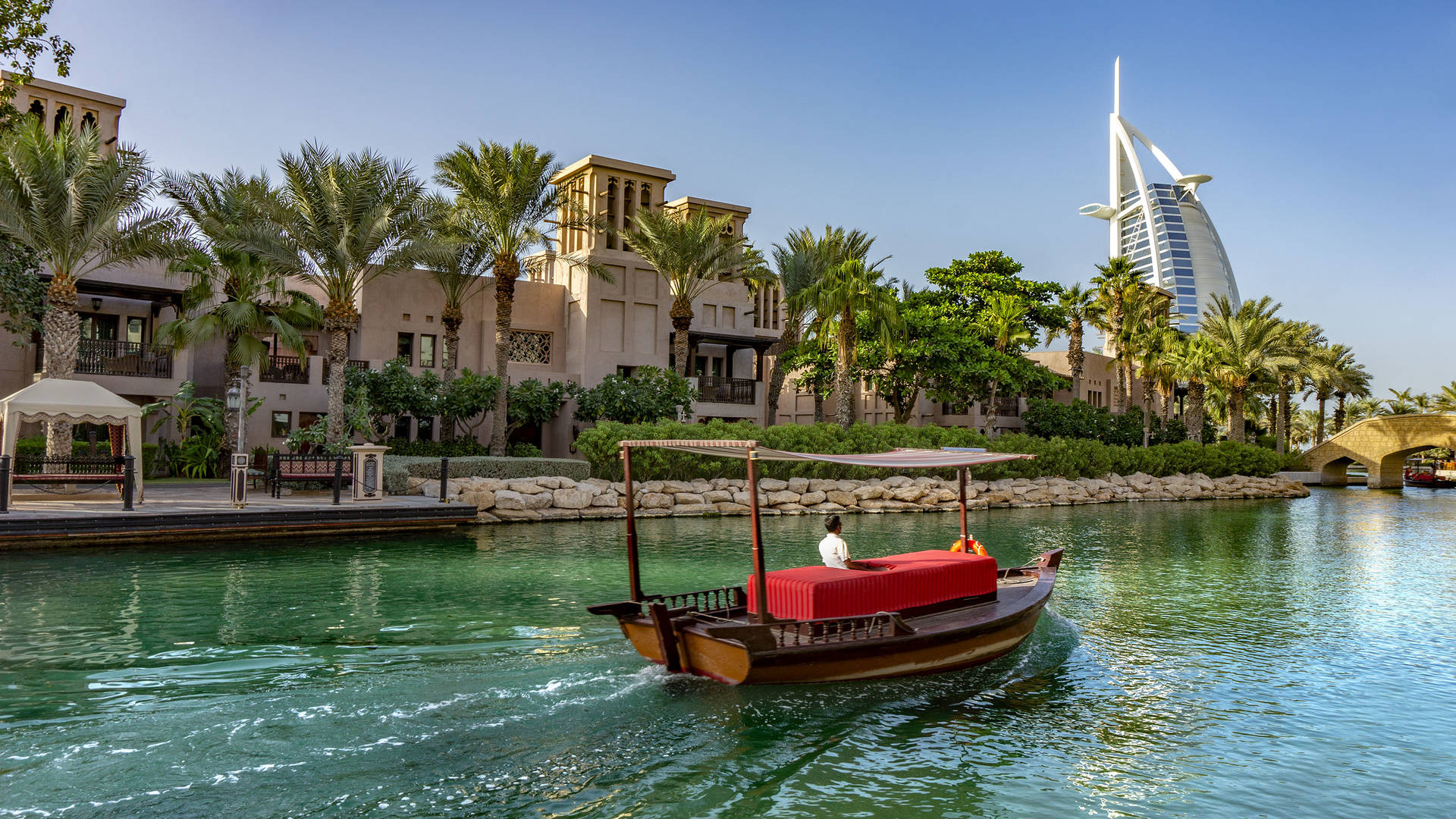 A boat sailing to a souk