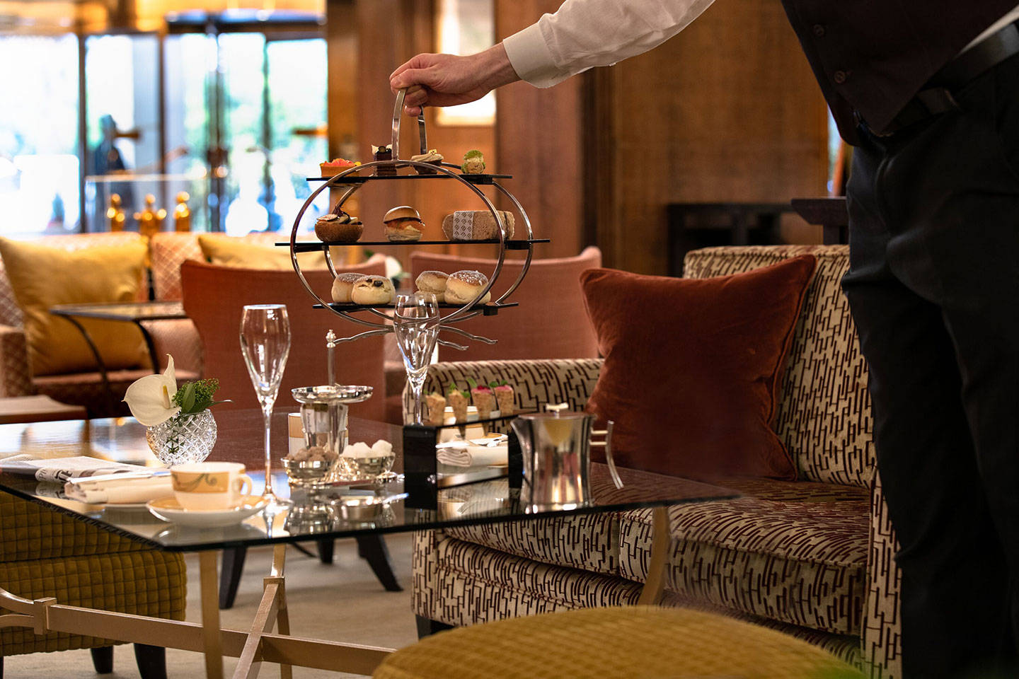 Jumeriah Carlton Tower Chinoiserie Waiter Placing Tea Tray